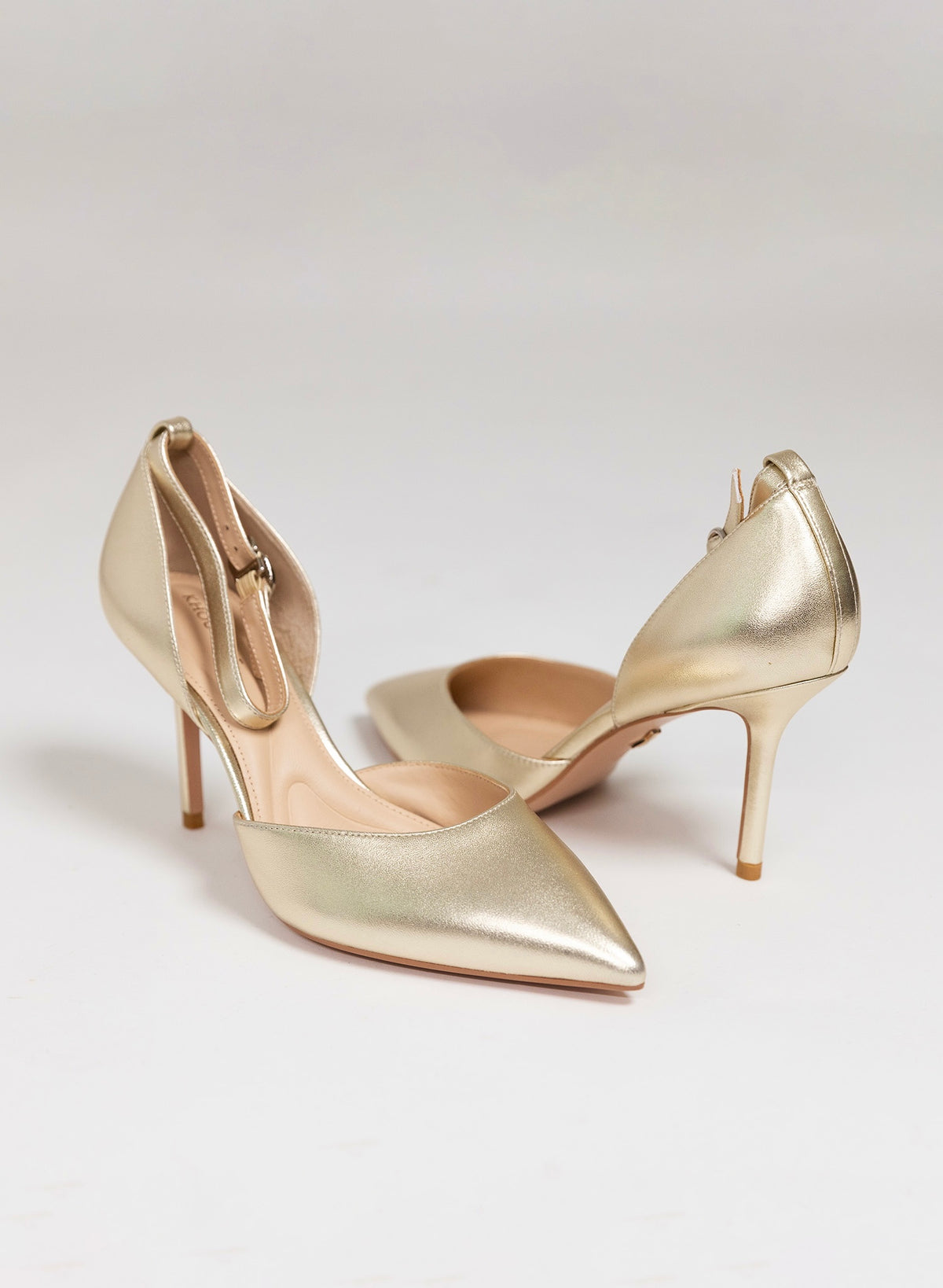 Adorné Gold flower strap and basic leather strap - One shoe, two strap options.